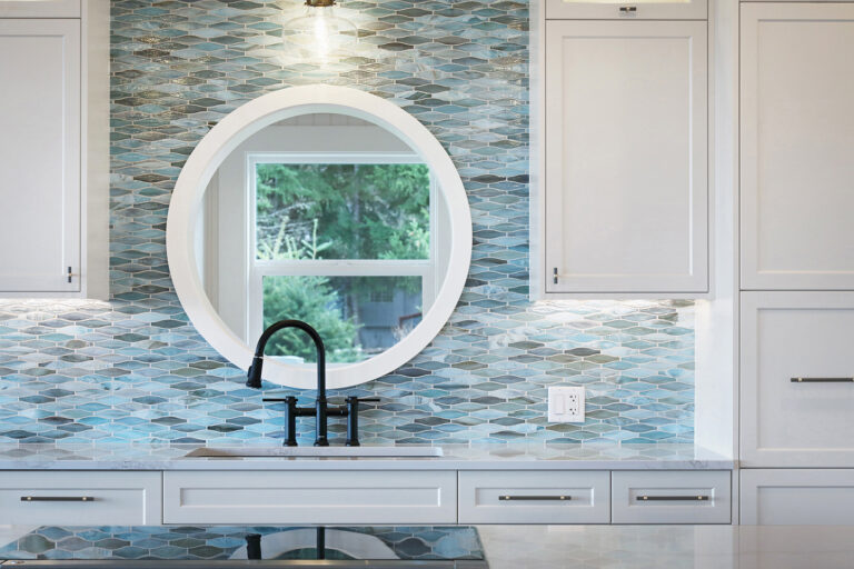 Gorgeous tile that mimics the ocean outside.  Photo credit: LSP Media
